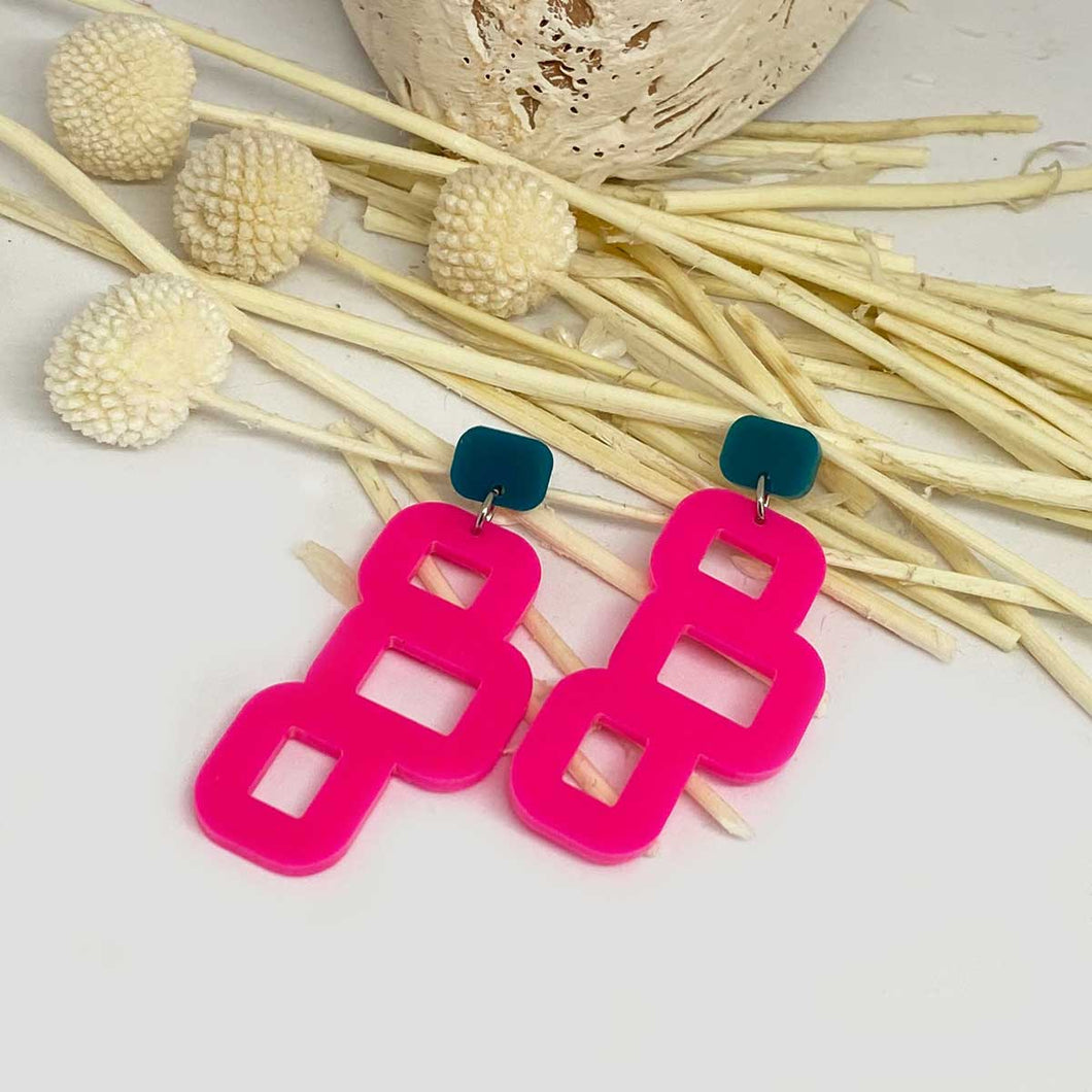 Bobby Teal Earbutton and Hot Pink Shape