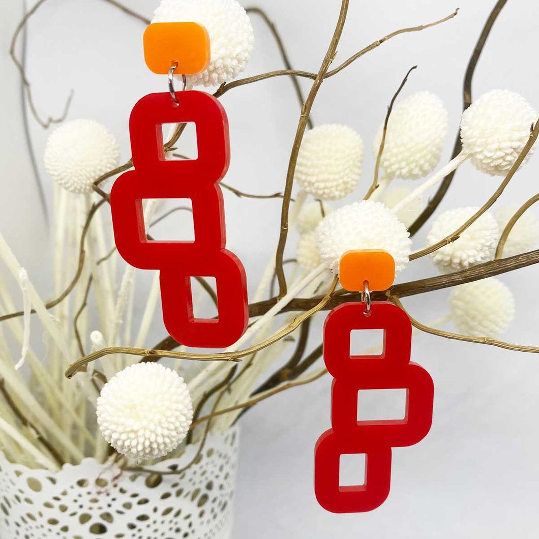 Bobby Orange Earbutton and Red Shape