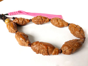 Strand of Vintage Chinese Beads Carved From Fruit Pits