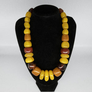 Vintage Tibetan Amber Necklace With Red Resin Accent Beads.